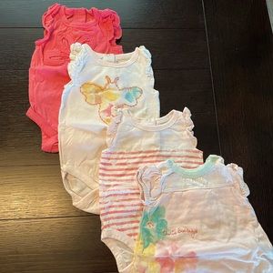 Lot of Burt’s Bees Baby Onesies